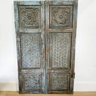 Pair of vintage Indian carved teak window shutters, distressed paint, 109 x 66cm