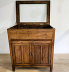 Teak chest with lift-up glass display top, styled