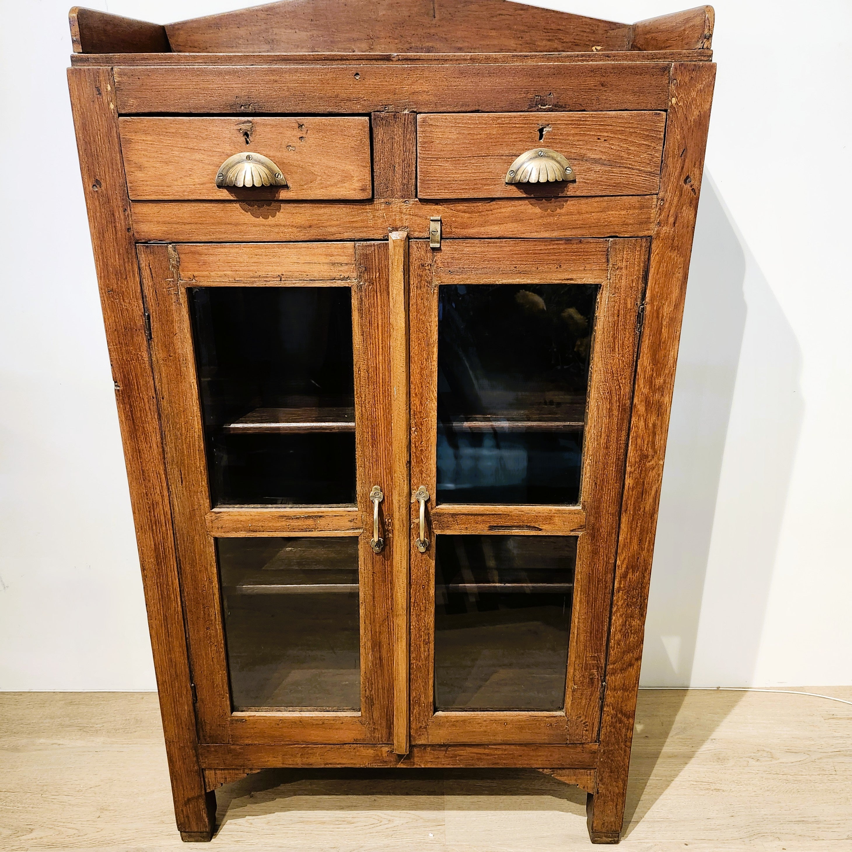 Small vintage teak glass-fronted cabinet with two drawers, brass handles, 127 x 74cm