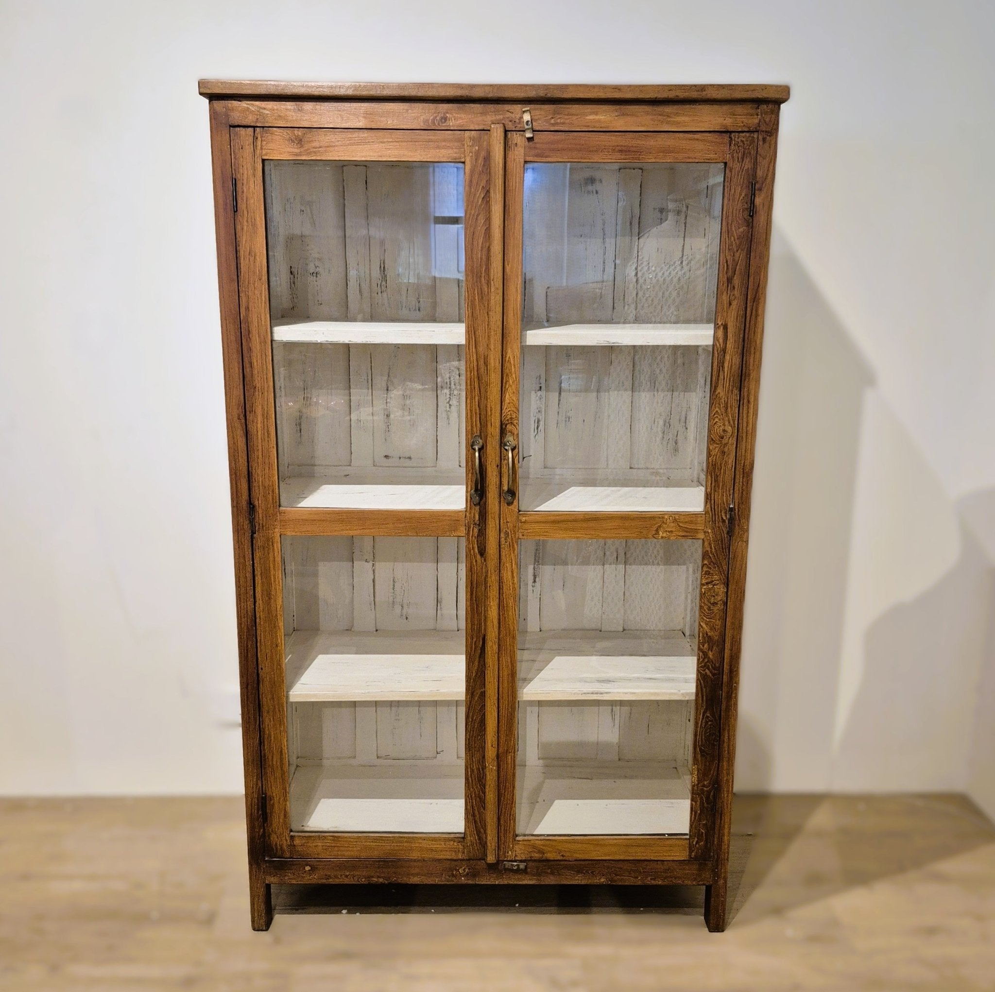 Large vintage teak cabinet with glass doors and three shelves, 152 cm high and 94 cm wide, from India