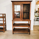 Vintage teak glass-fronted cabinet over open shelf, brass handles, 170 x 97cm