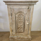 Vintage teak bedside table with carved floral door and bone handle, 66 x 45.7cm