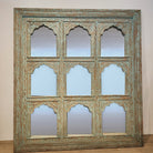 Upcycled teak mirrored panel with nine carved mirror sections, lightly distressed in aquamarine paint, 180 cm high