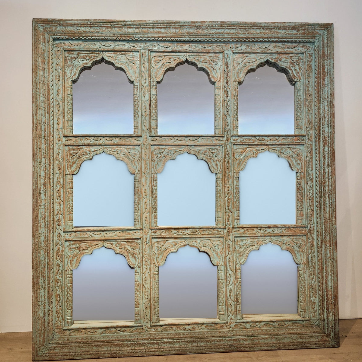 Upcycled teak mirrored panel with nine carved mirror sections, lightly distressed in aquamarine paint, 180 cm high