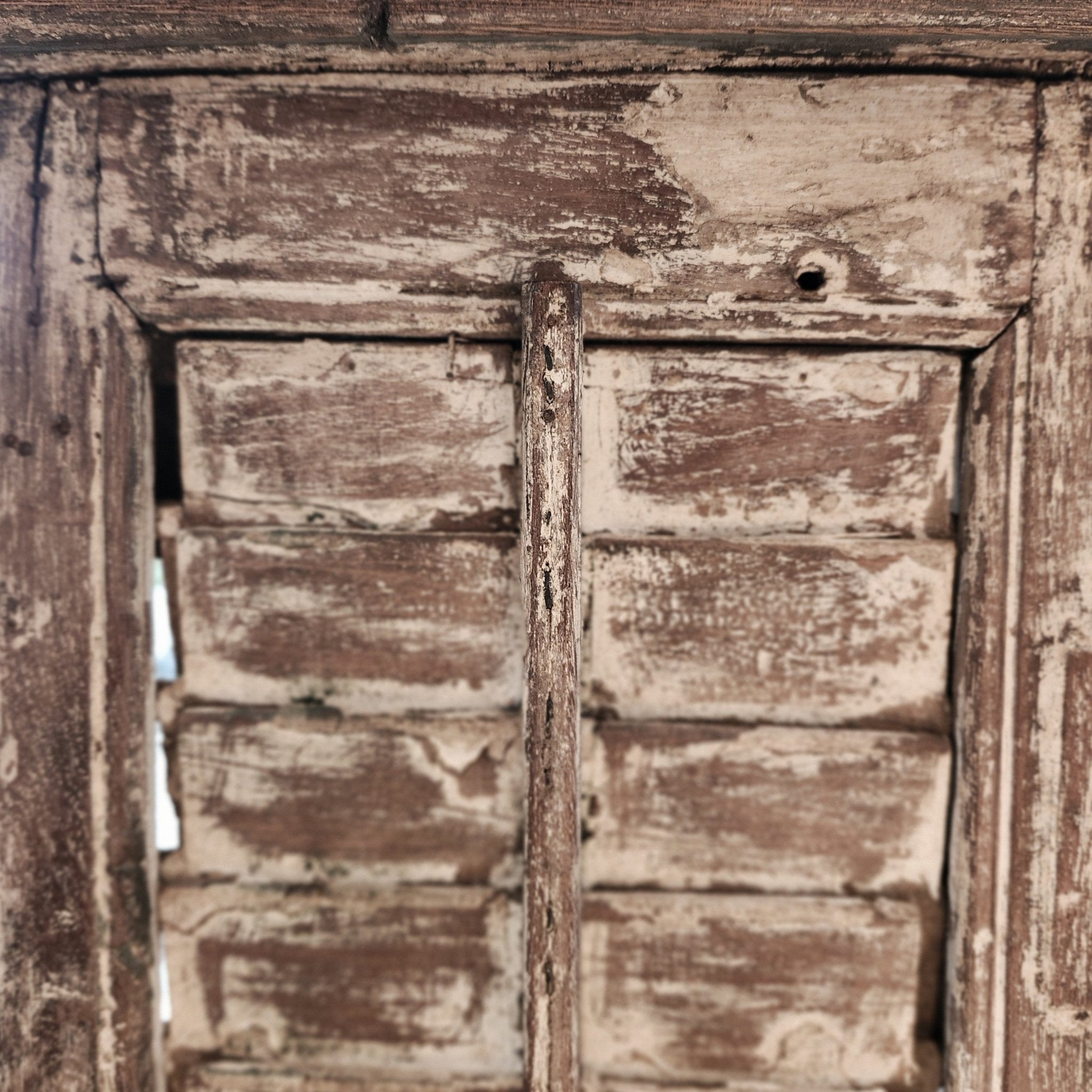 Louvred-shutter teak bookcase with a natural wax and white painted finish