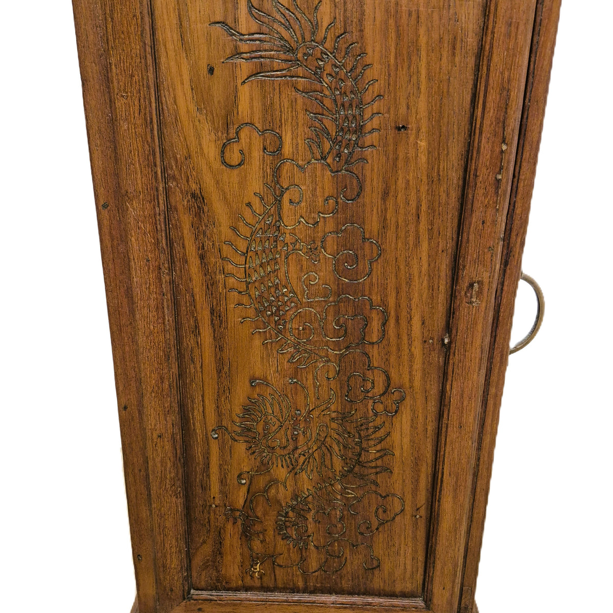 Small teak cabinet with a glass fronted section above a cupboard, carved with a dragon motif, 84 cm high