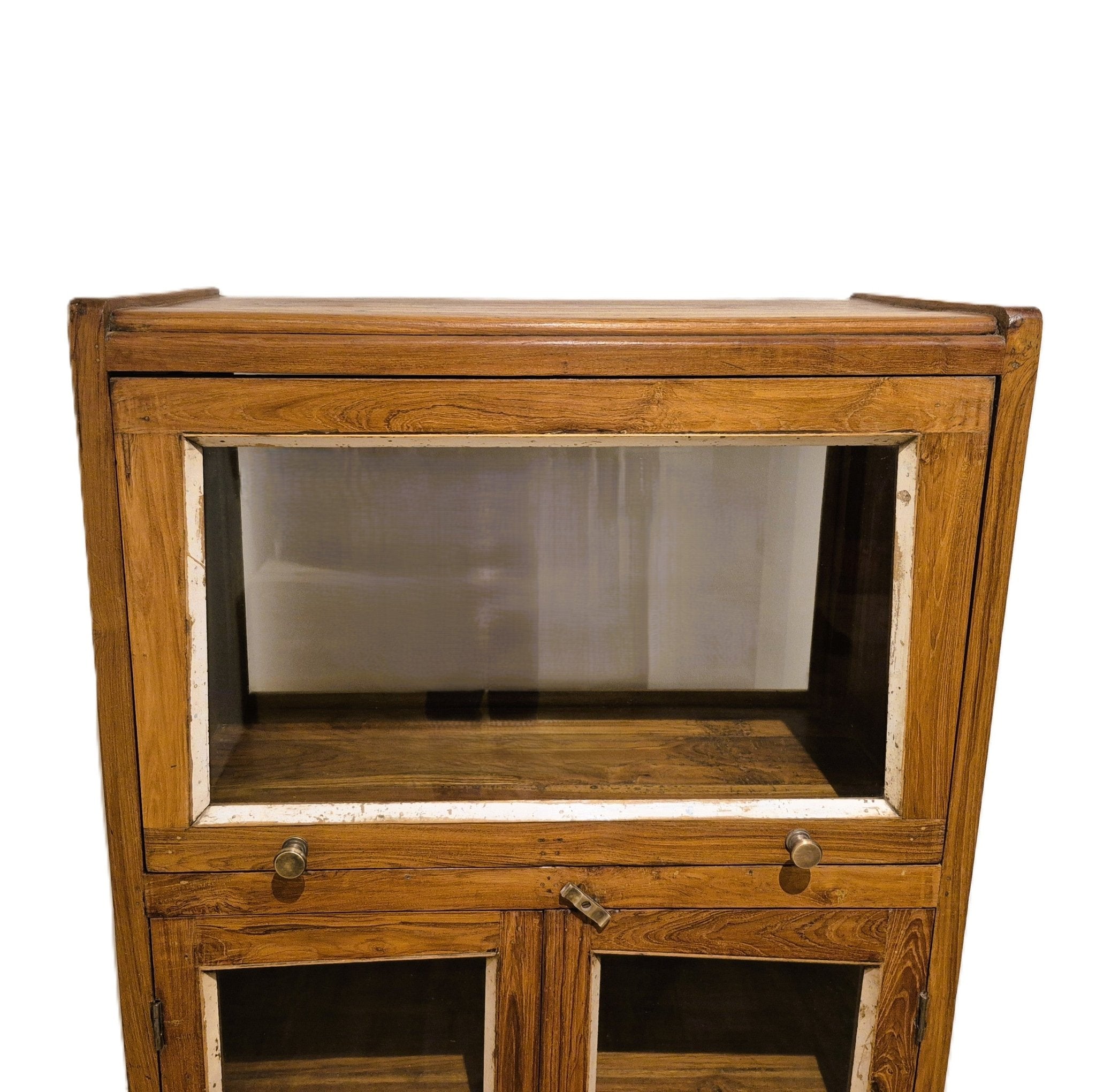 Glass fronted teak cabinet with two lower shelves for drinkware or tableware, 33 cm deep, from India