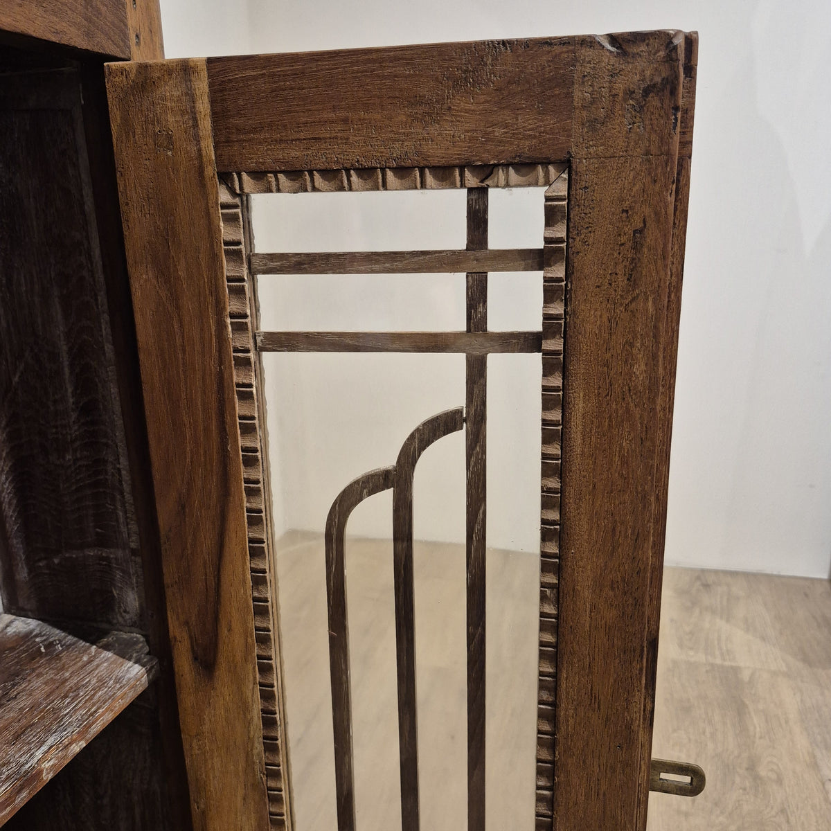 Side view of the vintage teak Art Deco cabinet, showing its 92cm height and 61cm width, made in India.