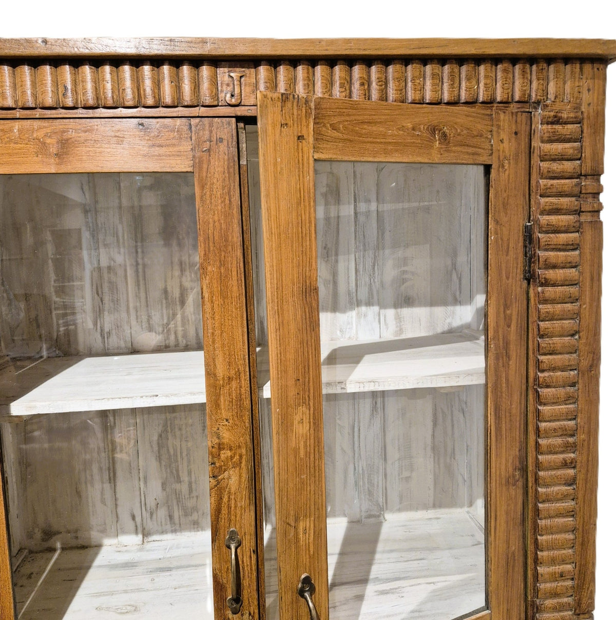 Teak glass fronted cabinet with three internal shelves and a whitewashed interior, 44 cm deep, from India