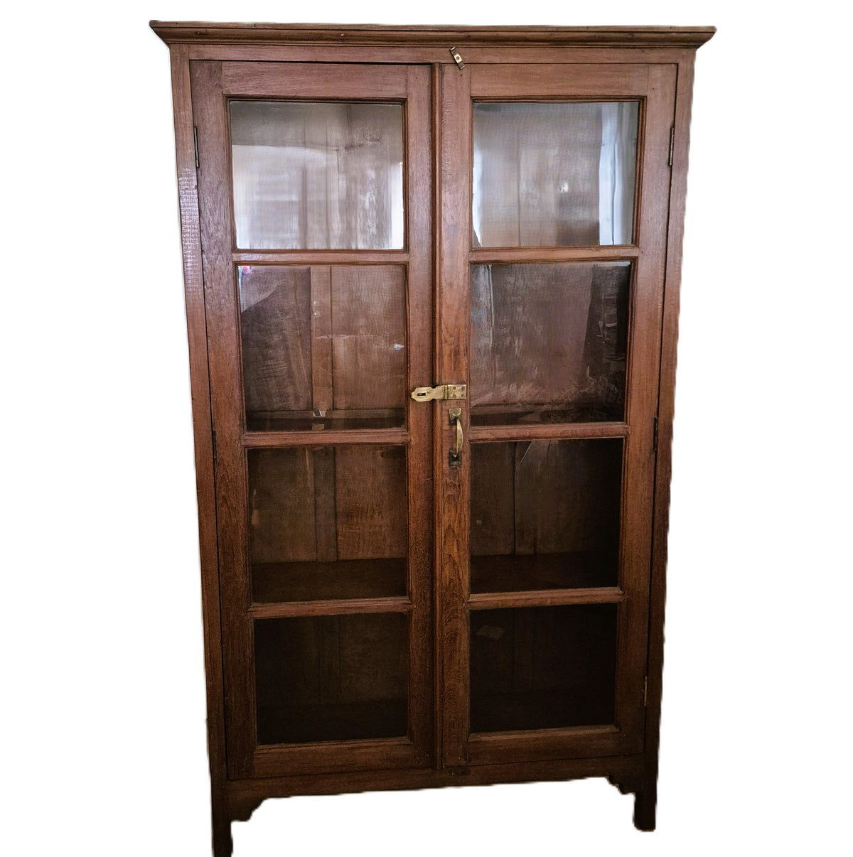 Narrow vintage teak bookcase with glass doors and four shelves, 185 cm high and only 34 cm deep, India