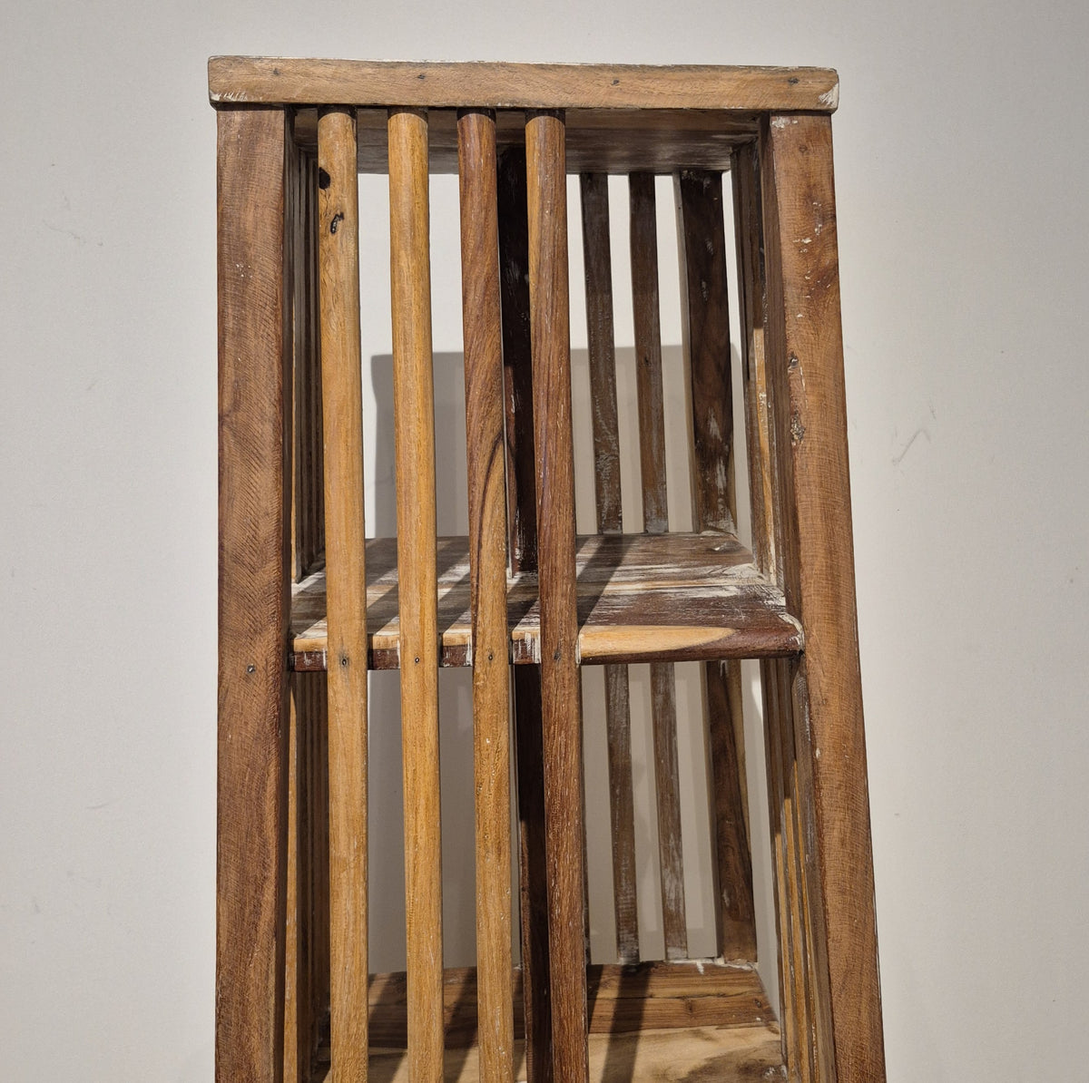 Mango wood book case finished in distressed white paint and natural wax, four shelves, made in India