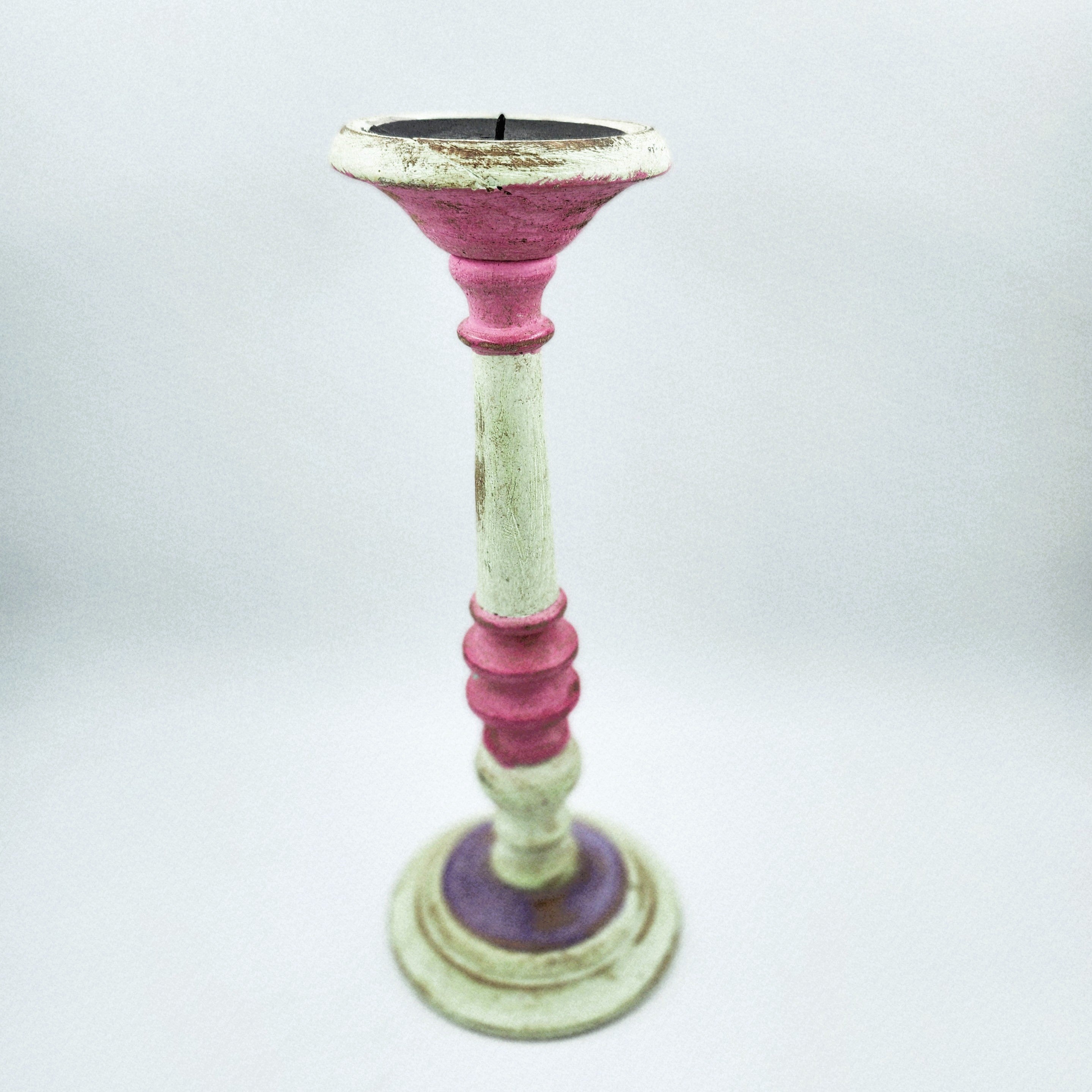 Painted wood candlestick in matte pink, tall, rustic style