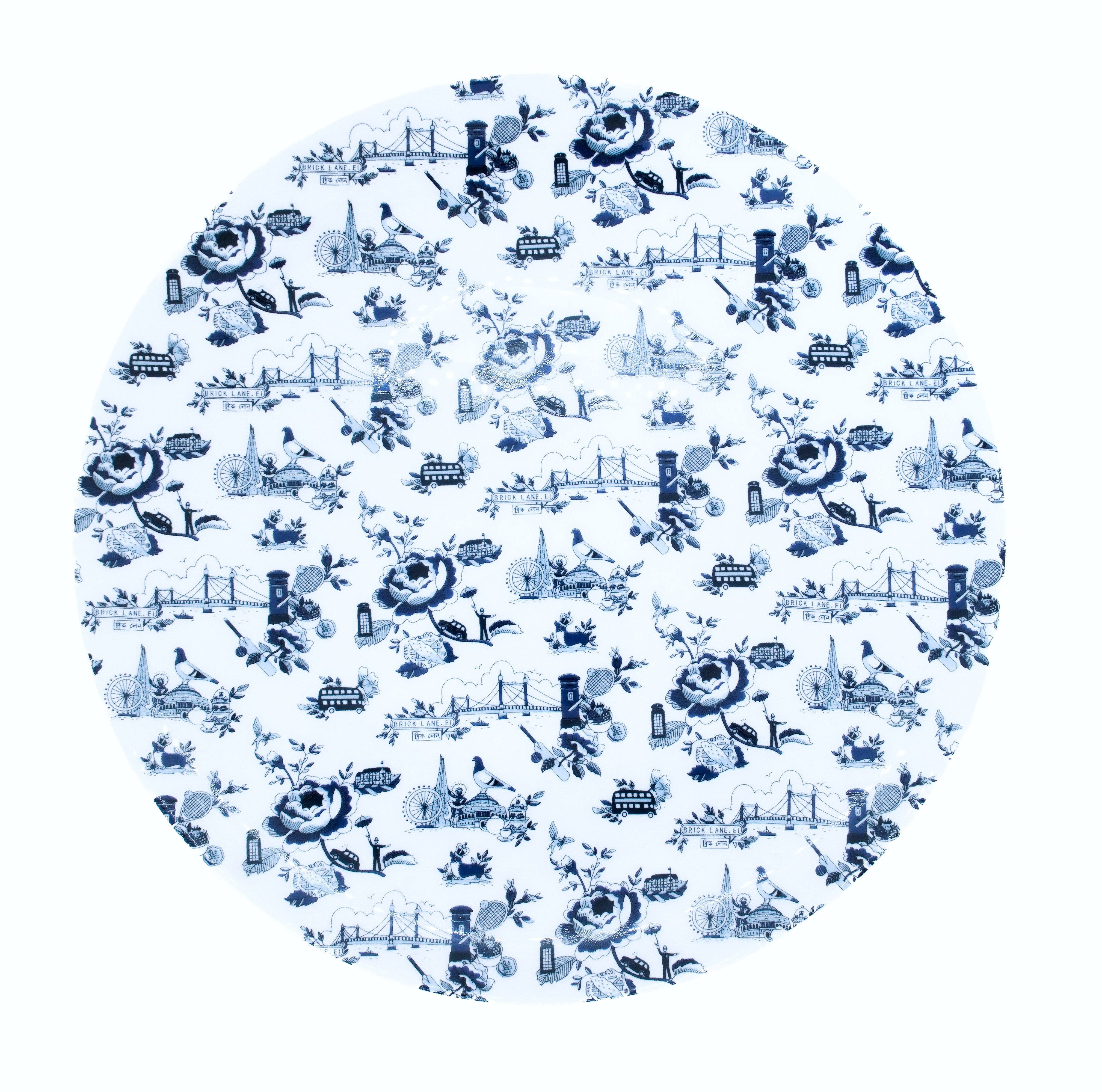Round blue and white London Toile patterned plate on a white background