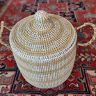 Small white-detail seagrass laundry basket, handwoven, detail