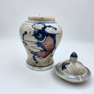 Catfish scented candle in small ceramic temple jar featuring a catfish, organic soy wax
