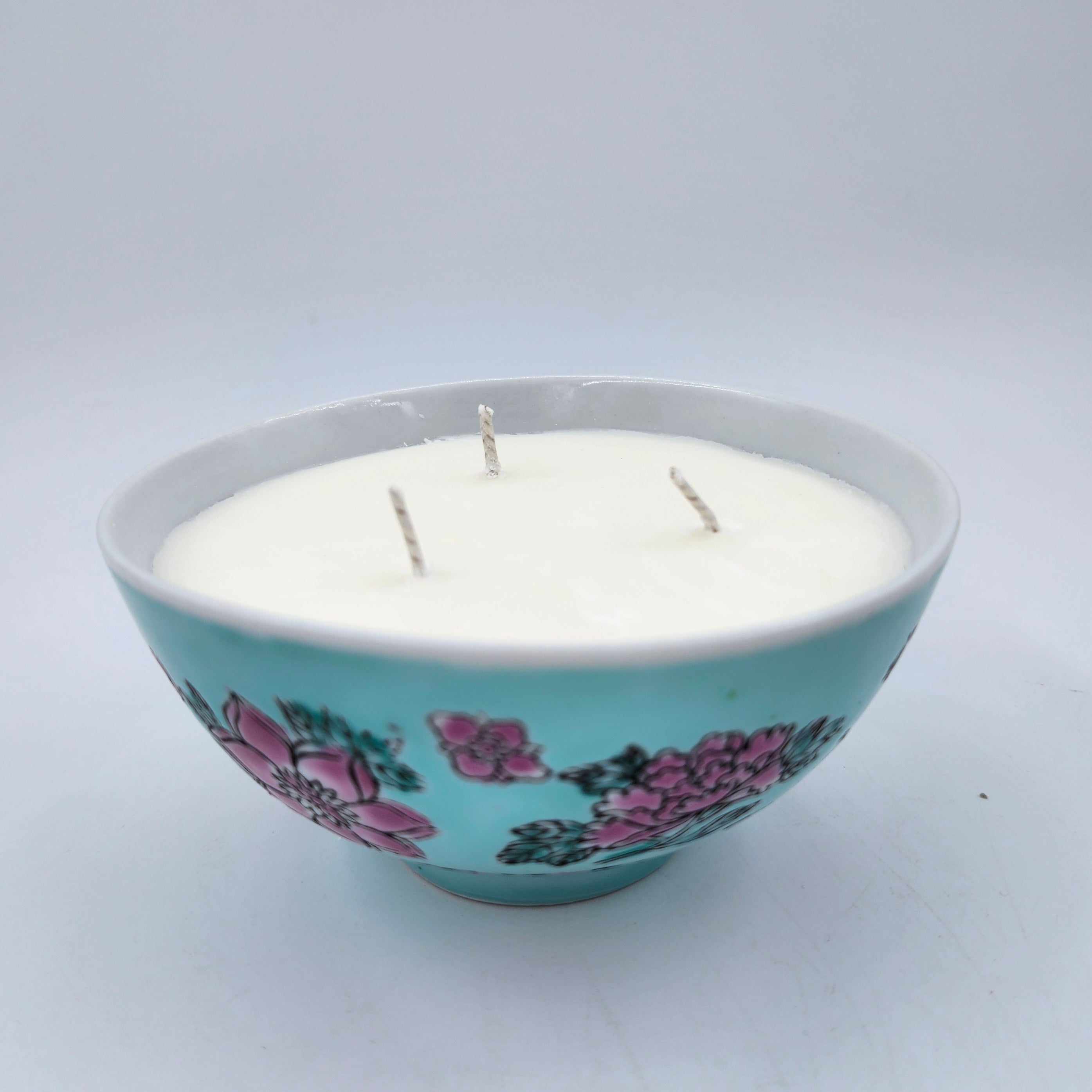 Teal Bowl candle, flower-decorated teal rice bowl, detail