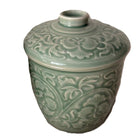 Celadon Jacquard candle, upcycled celadon pot, styled view