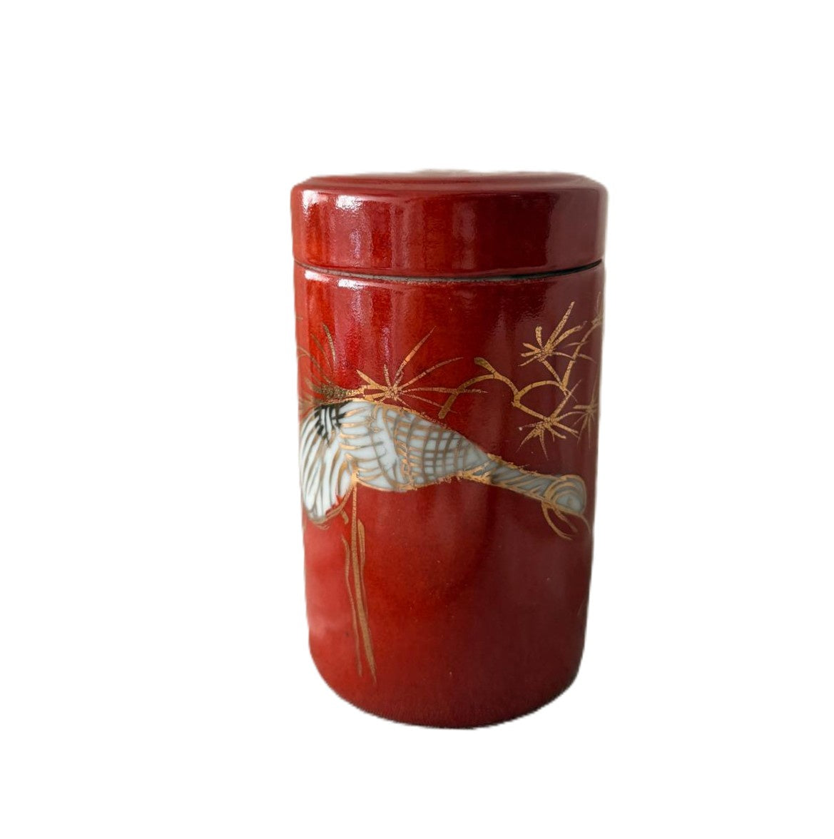 Red Crane scented candle, vivid red lidded pot painted with a crane and gold branches, Stanley scent