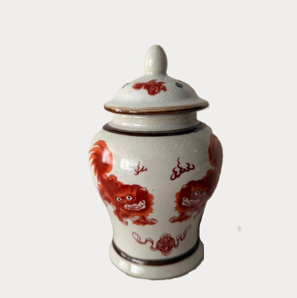 Foo Dogs candle, painted lidded ceramic jar, organic soy wax, styled view