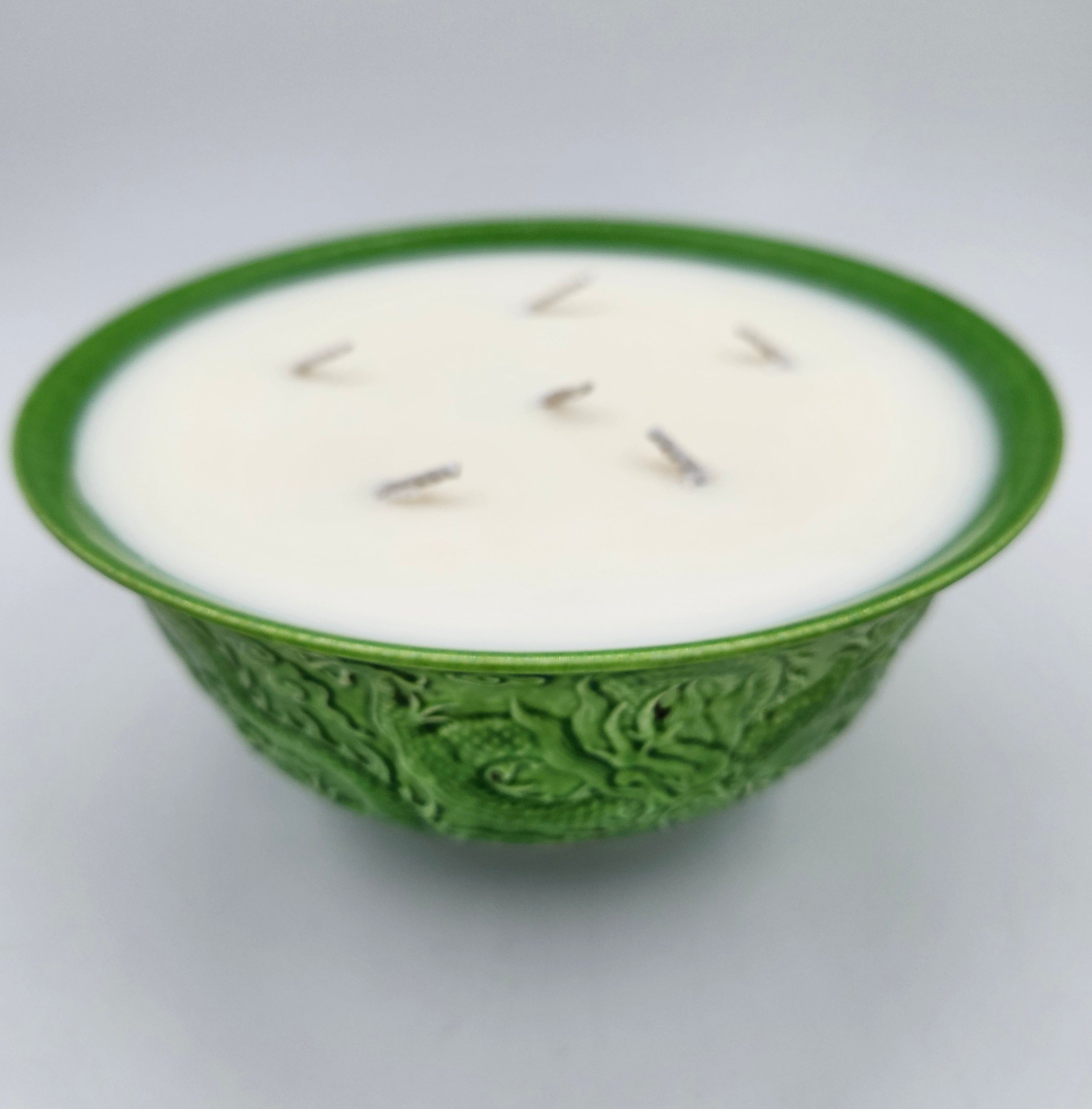 Grass Green Dragon candle, green dragon bowl, styled view