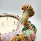 Legend candle, hand-painted snake and peach design, detail
