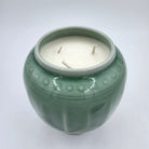 Wisdom candle, celadon pot with tortoise knob, detail