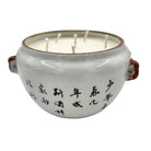 A Journey Begins candle, hand-painted Chinese figures on ceramic jar, detail