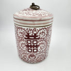 Scented Candle in a Ceramic jar with red floral patterns and the Chinese Double Happiness symbol