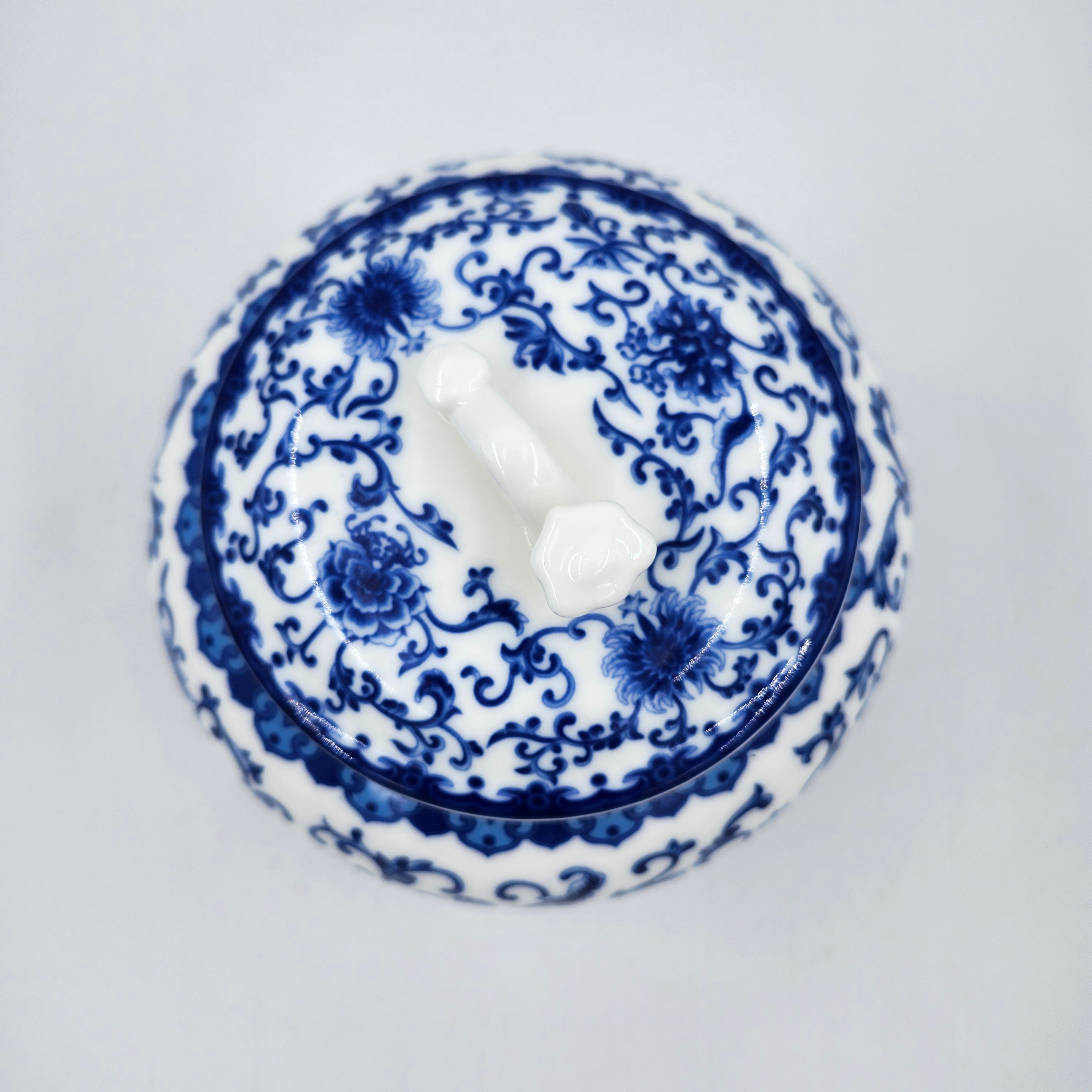 Lid of blue & white ceramic scented candle