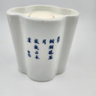 Ceramic scented candle with Chinese inscription on the rear