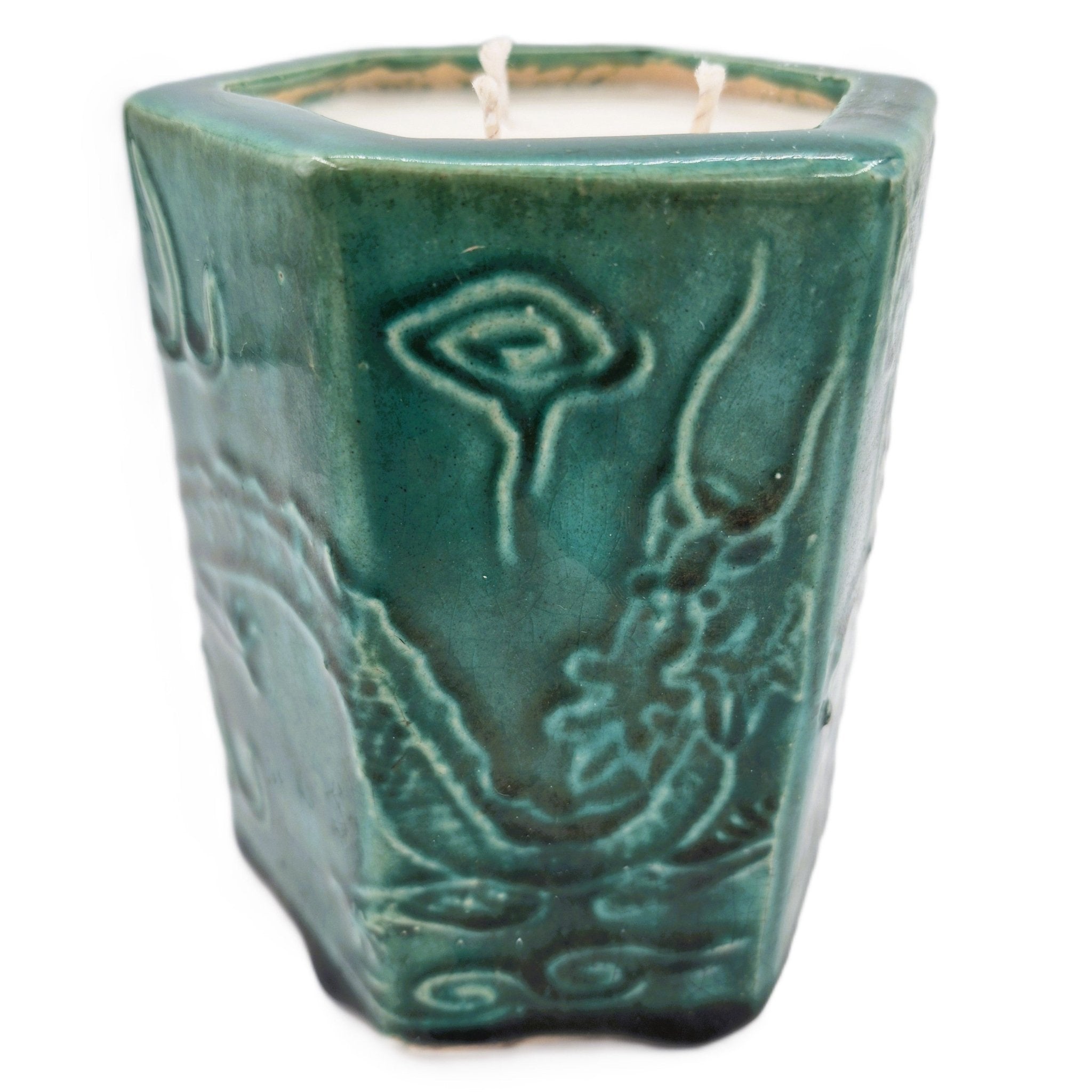 Emerald Dragon candle, dragon-motif hexagonal pot, styled view