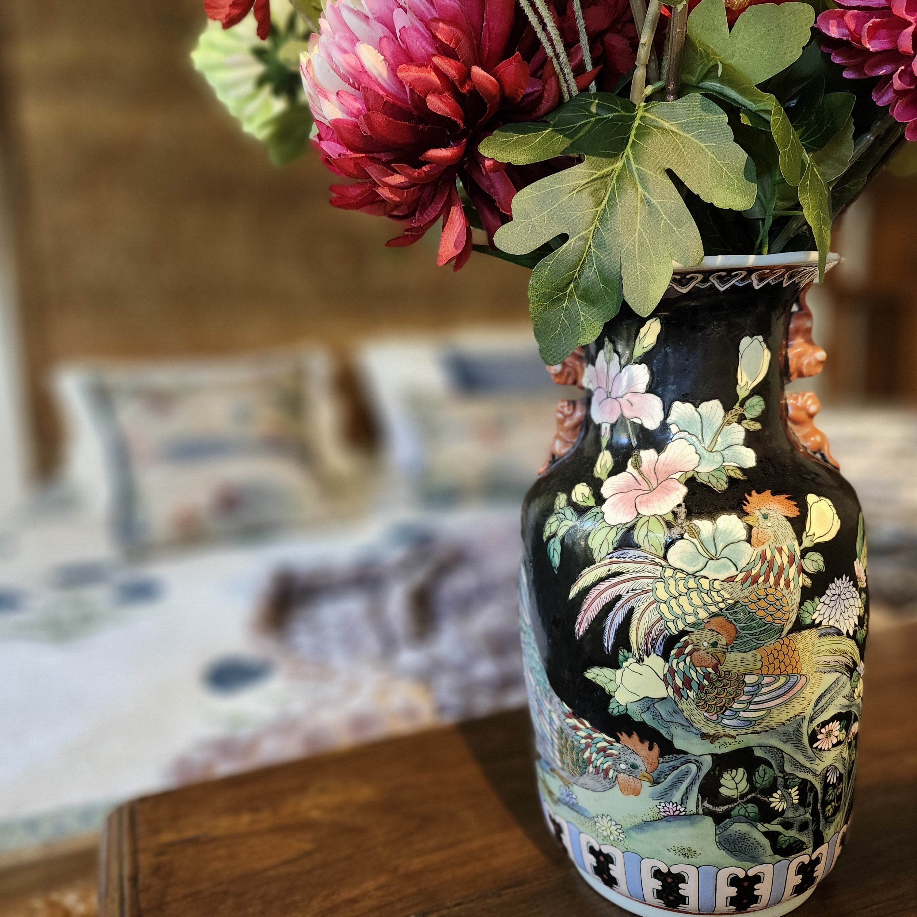 Famille Rose vase with cockerels and flowers on black ground, 37cm high