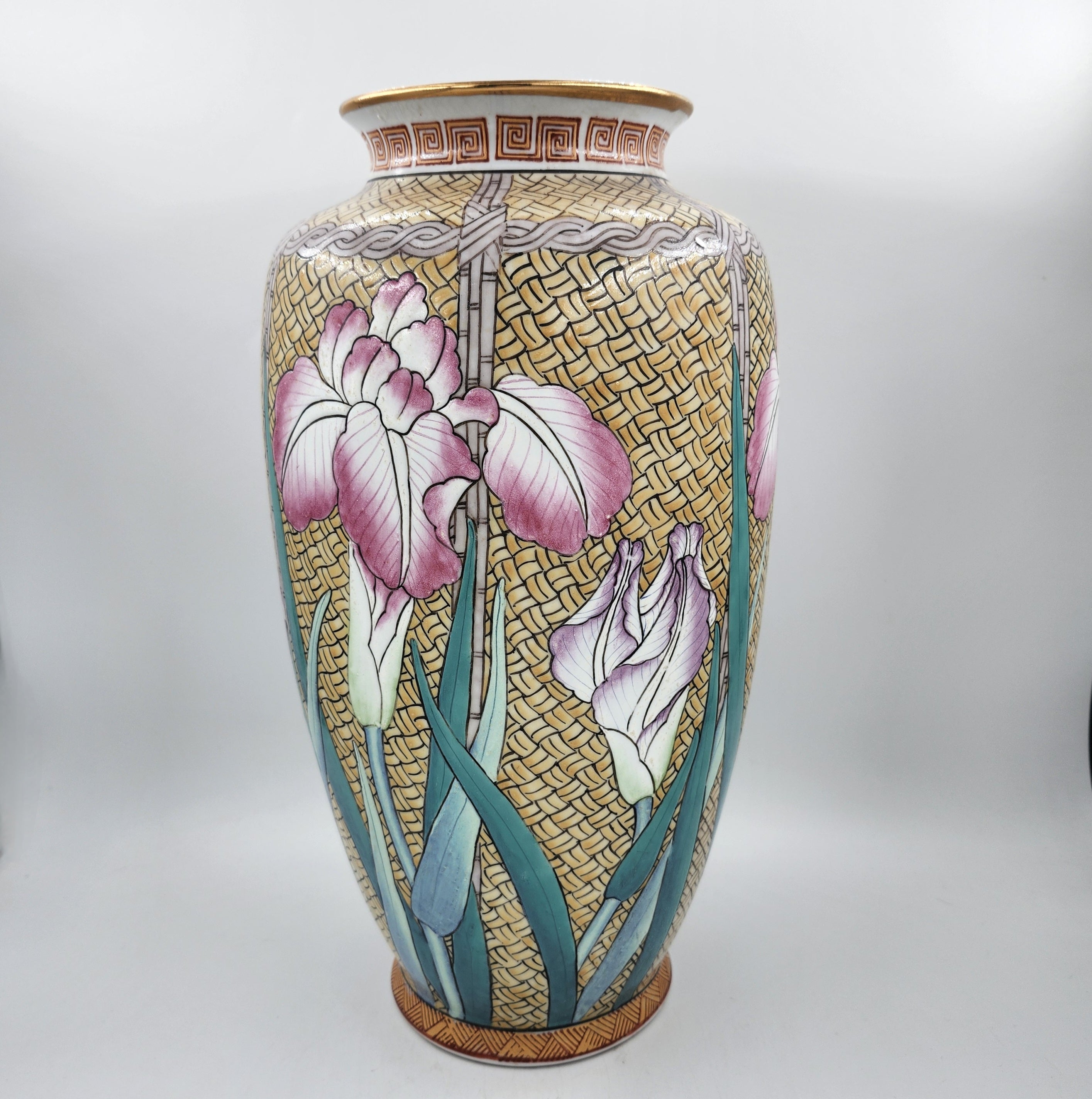Famille Rose vase with pink and mauve iris on wicker, gold-edged, 35.5cm high