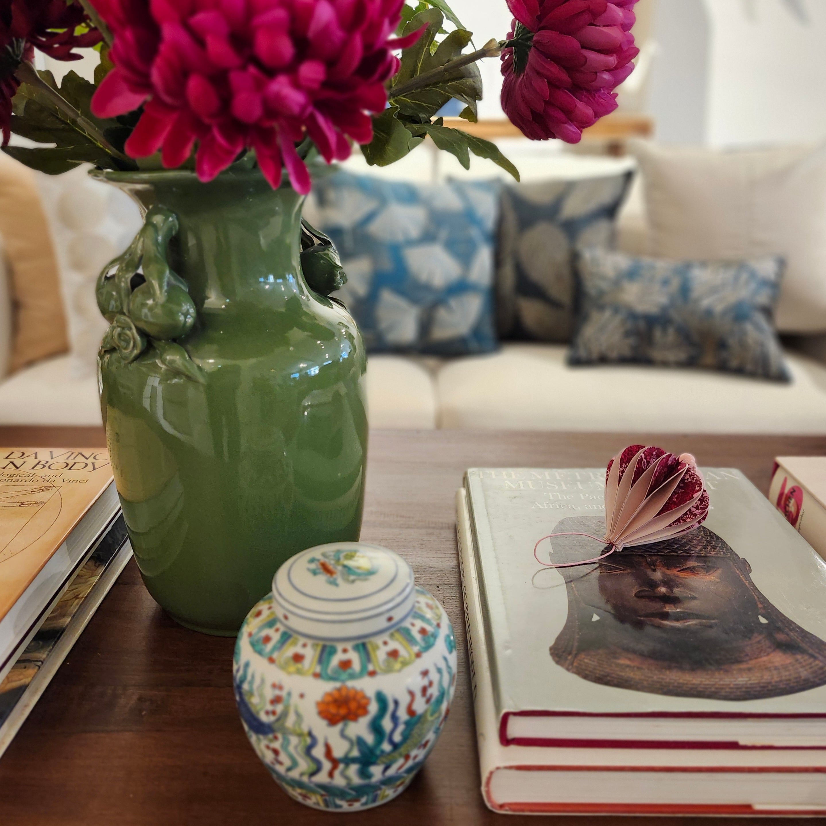 Little Fishes candle, green underwater-garden pot, styled view
