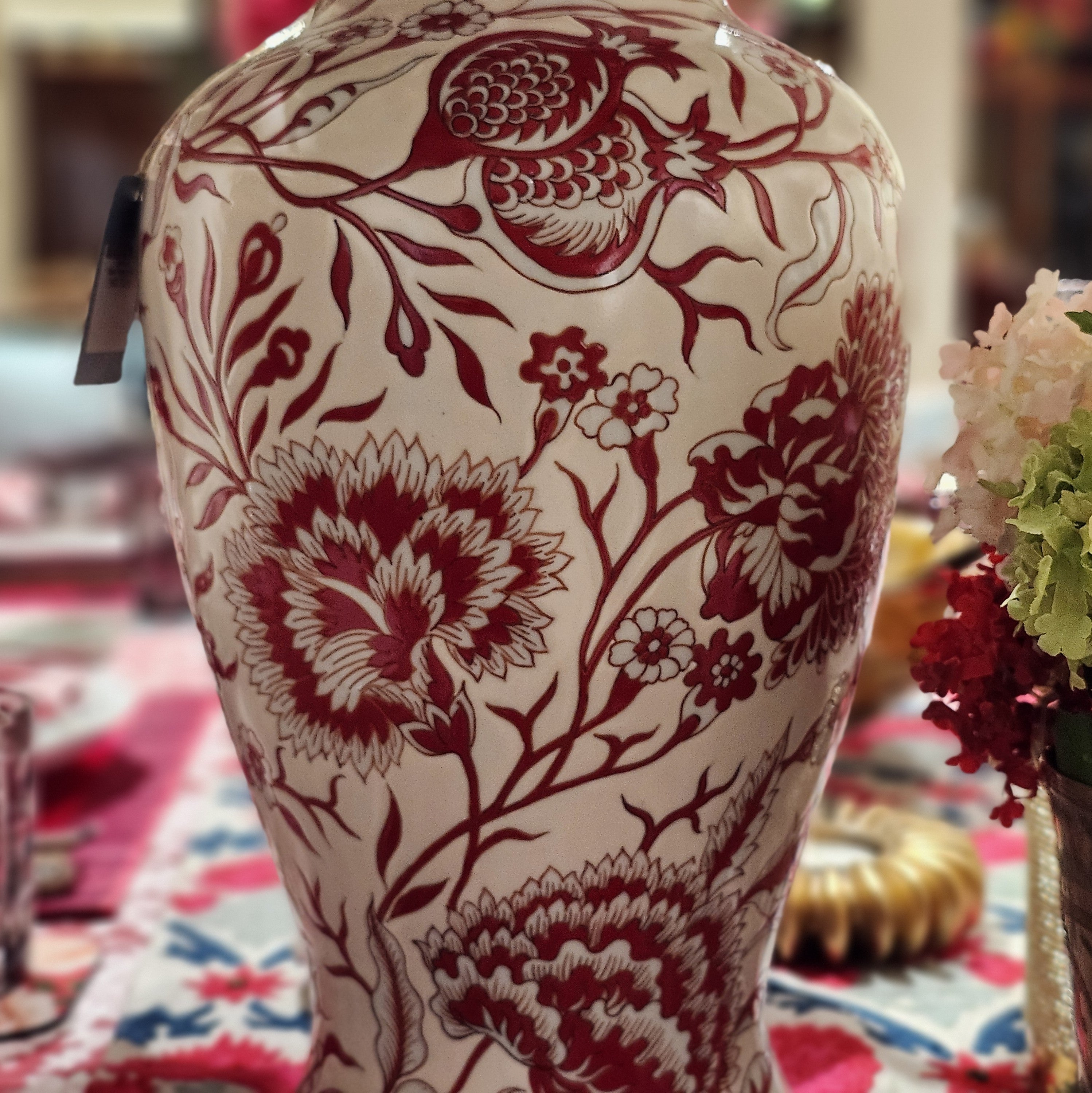 Vintage pomegranate porcelain vase, cream ground, styled