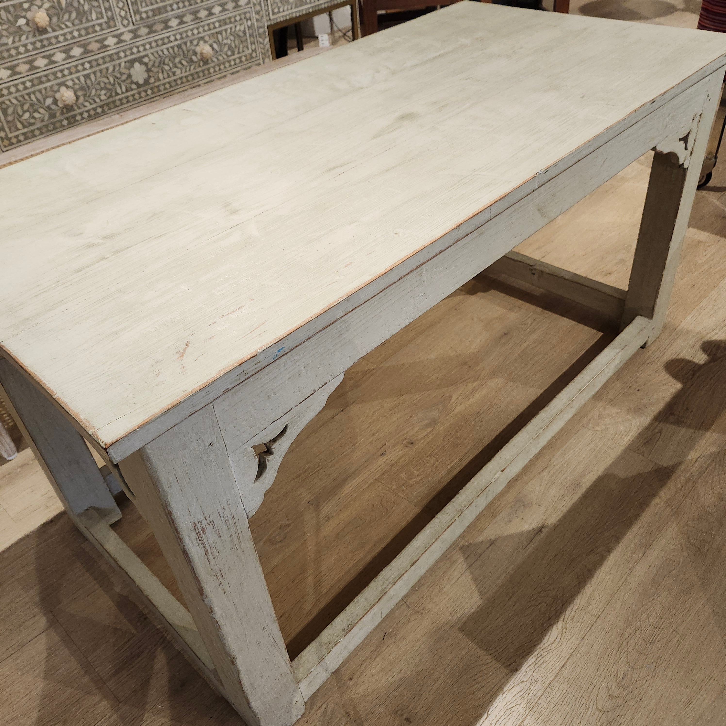 Vintage teak table in pale pistachio, lightly distressed, styled view