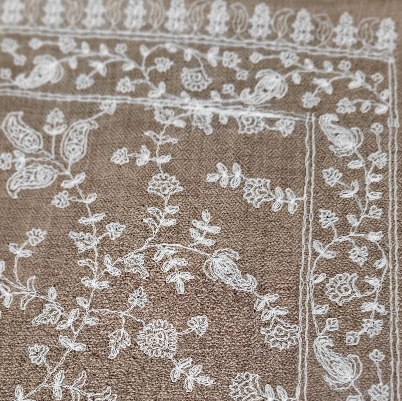 Pashmina with taupe floral embroidery on white, detail view