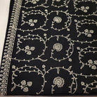White floral embroidery on black pashmina, 100% pashmina, detail view