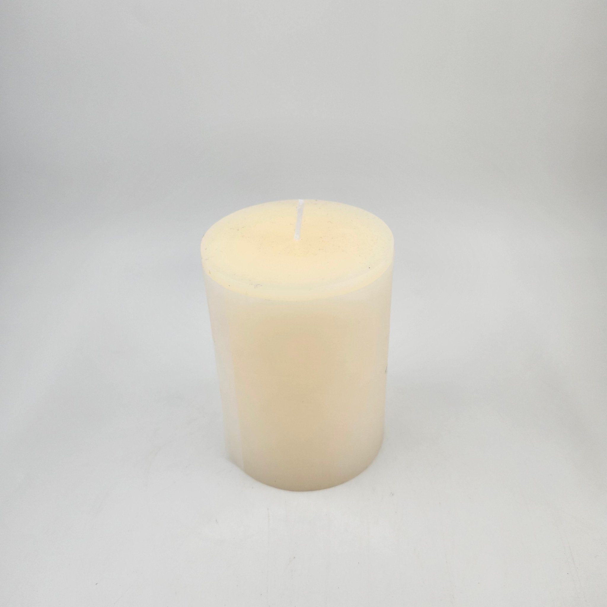 Off white pillar candle 7.5 x 10cm