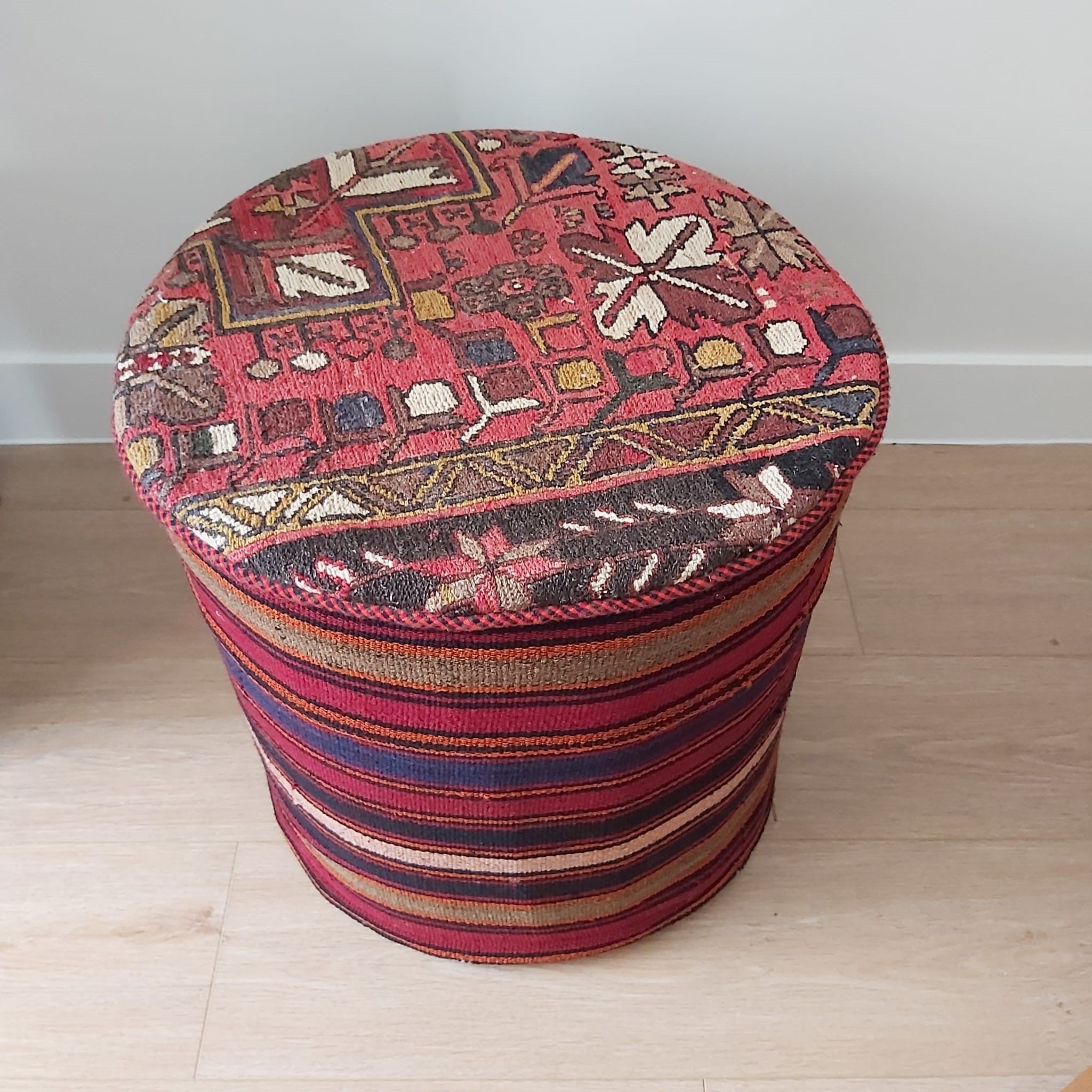 Vintage carpet pouf, wool exterior with poly filling, styled