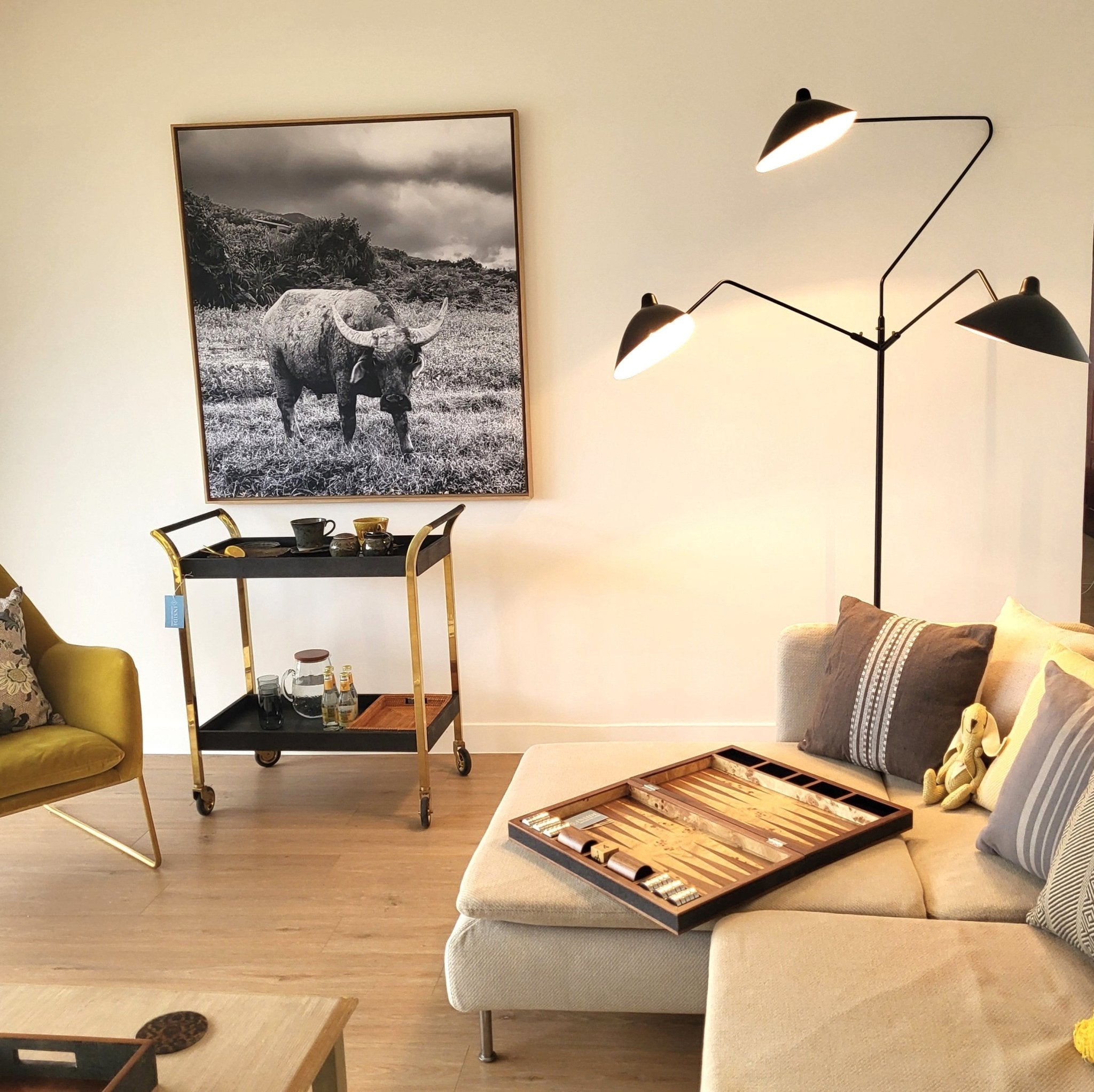 Woodstock drinks trolley in seal brown faux shagreen, styled in a living room setting