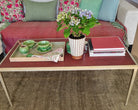 Red faux shagreen coffee table with silver metal leaf border, 120 x 66 x 47 cm, detail view