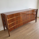 Swedish mid-century walnut and beech dresser by William Hinn, eight drawers