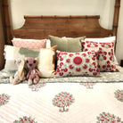 Queen four poster bed, bamboo-effect posts with finials, side view