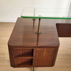 Mid-century executive desk, glass top and brass frame, detail view