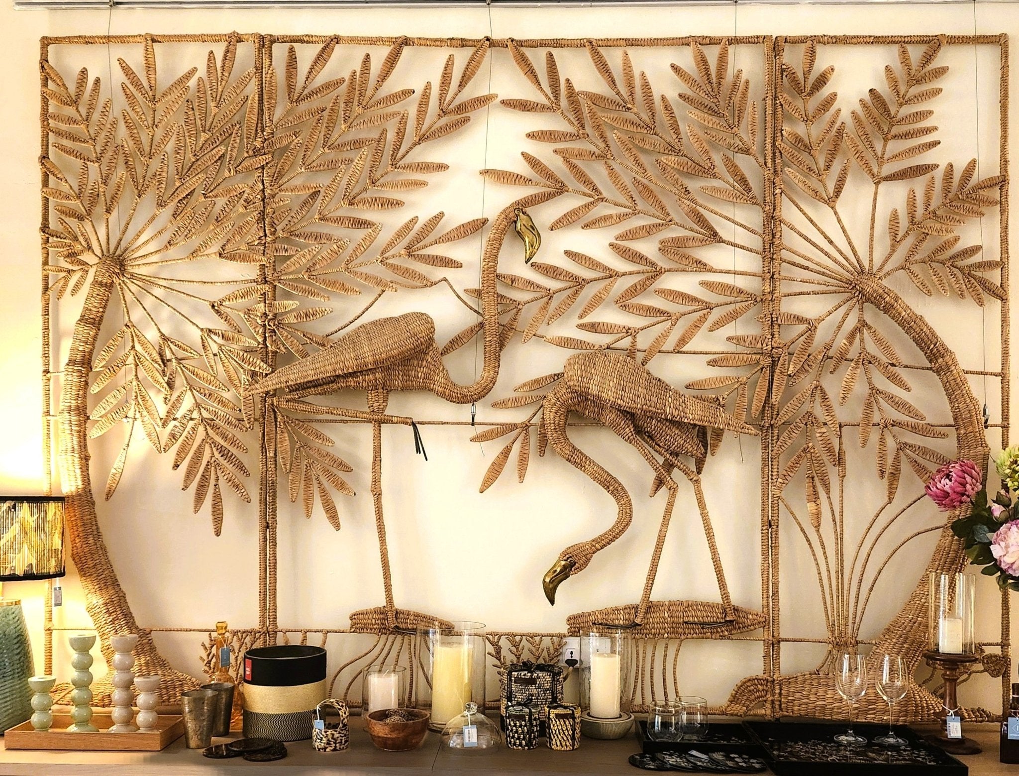 Rattan flamingo screen, 255 x 180 cm, styled against a coloured wall, Maria Lopez Torres