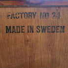 Swedish mid-century walnut dresser, curved front, side view