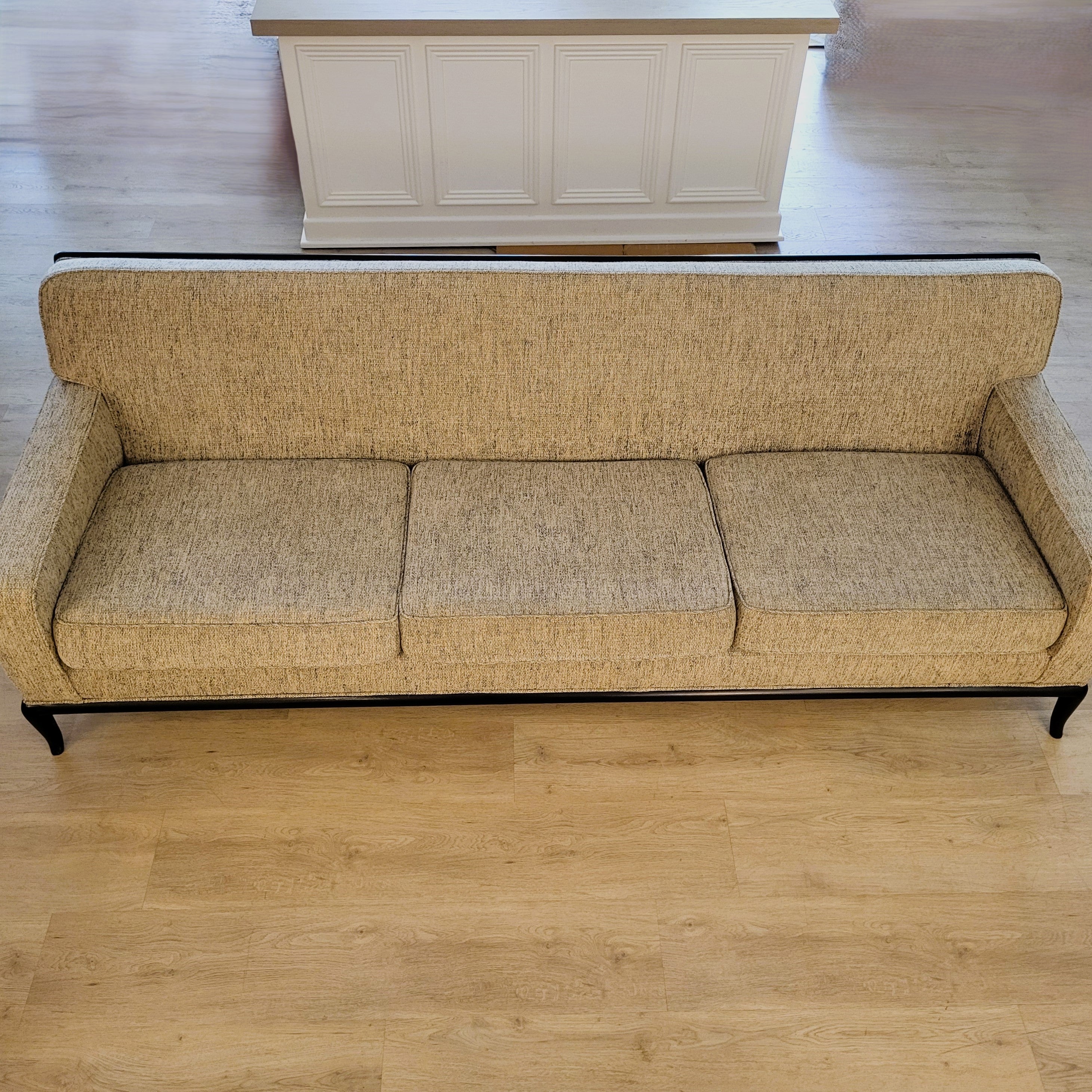 Robsjohn-Gibbings three-seater sofa, side view