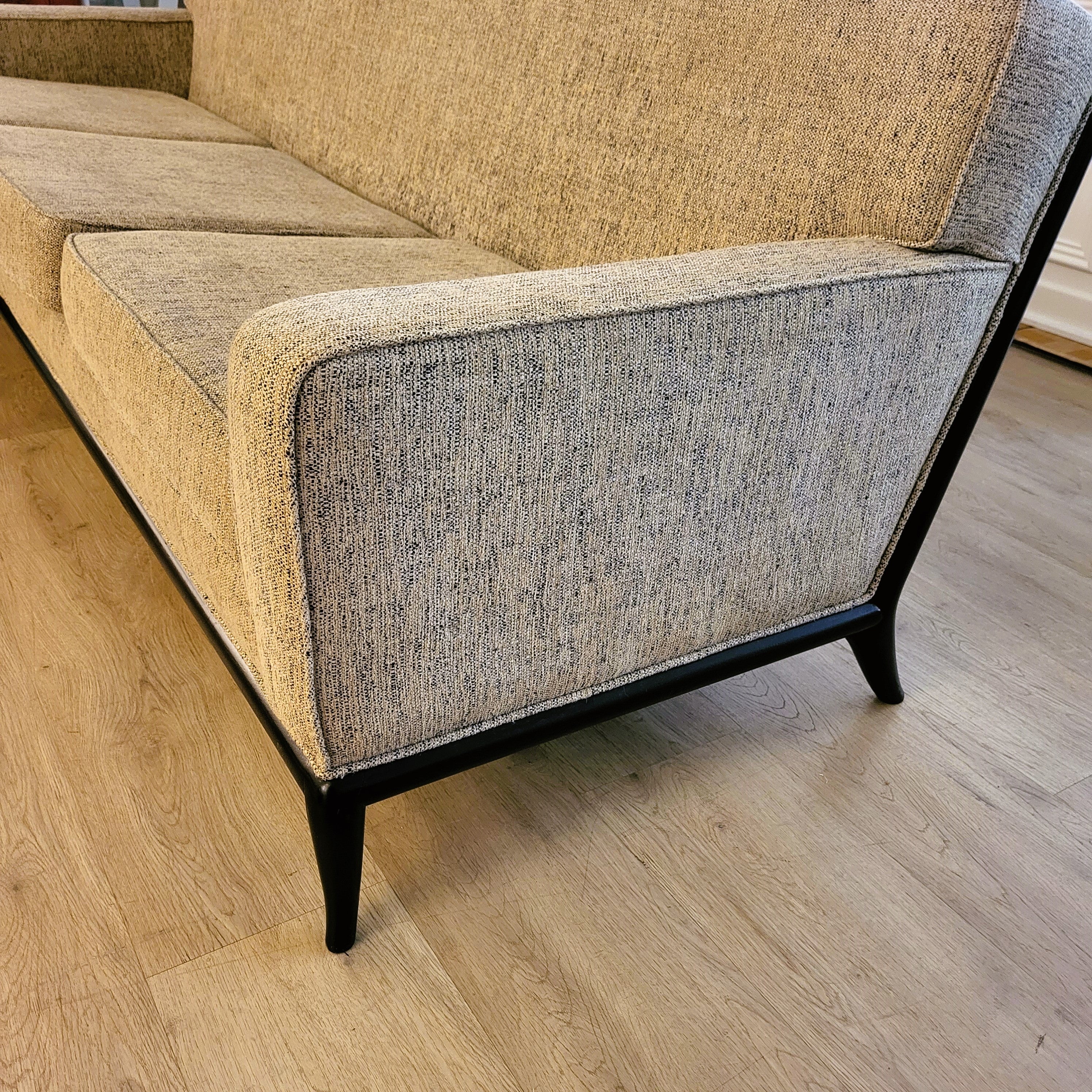 Robsjohn-Gibbings sofa, wood-framed three-seater, styled