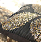 Birch Leaf embroidered cushion in blue-black, 45 x 45 cm, styled in a room